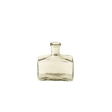 Clear glass bottle vase size small on a white background