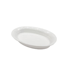 white oval dish with patterned edge