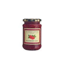 jar of thursday cottage raspberry jam on a white background