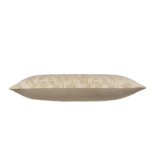 Beige patterned floral pillow on a white background from the side