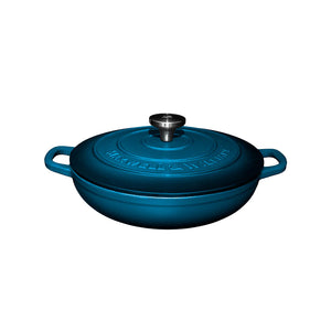 Blue cast iron cookware braiser pot with lid on a white background