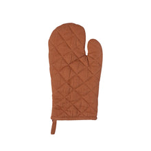 cinnamon coloured quilted oven mitt on a white background