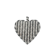 Heart-shaped pot holder with black and white striped pattern on a white background