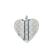 Heart-shaped quilted pot holder with black stripe design on a white background