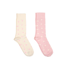 Beige and pink pairs of socks with heart pattern