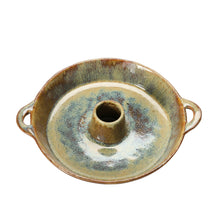 Ceramic dish with handles and toothpick holder on a white background