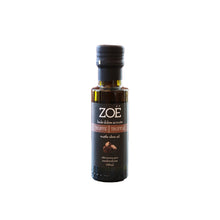 Bottle of Zoe truffle olive oil on a white background