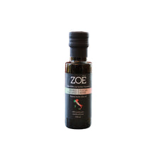 Bottle of Zoe tuscan herbs olive oil on a white background