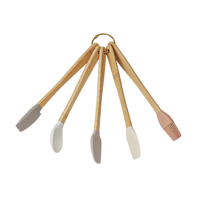 Set of beech wood kitchen utensils with silicone heads on a white background