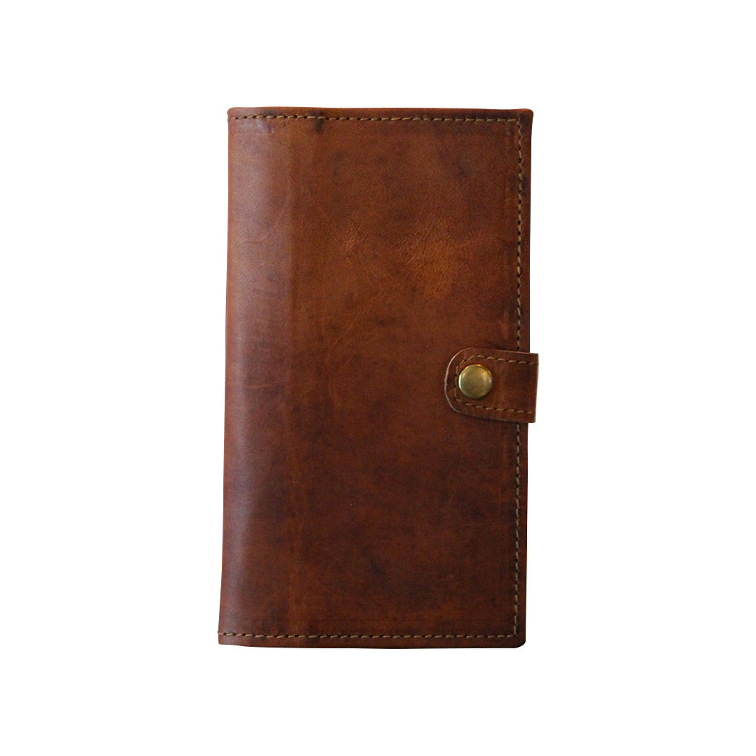 folded leather wallet with snap closure